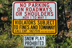 photo of no parking and snow play prohibited sign.